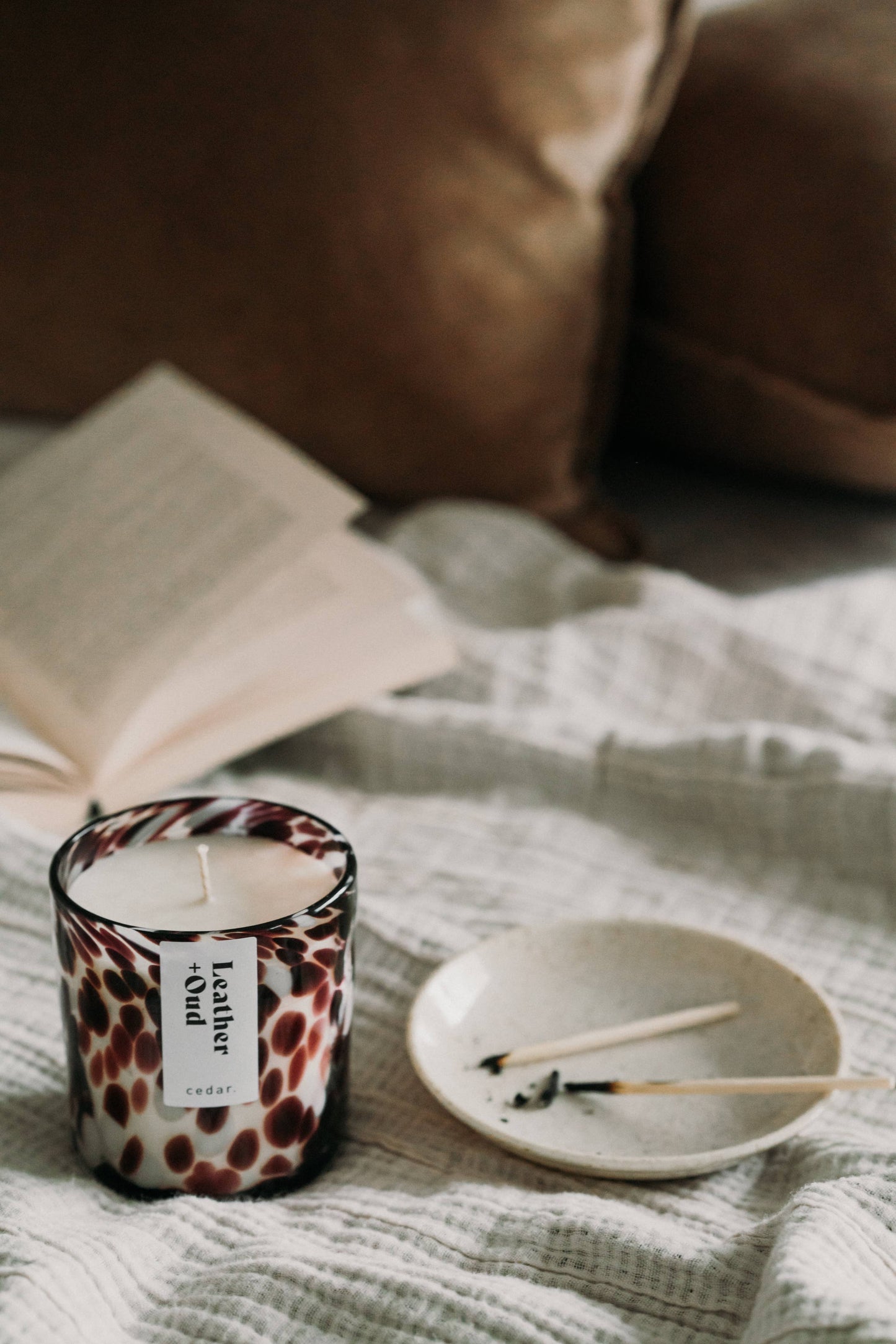 Leather + Oud Scented Candle in Patterned Hand-blown Vessel