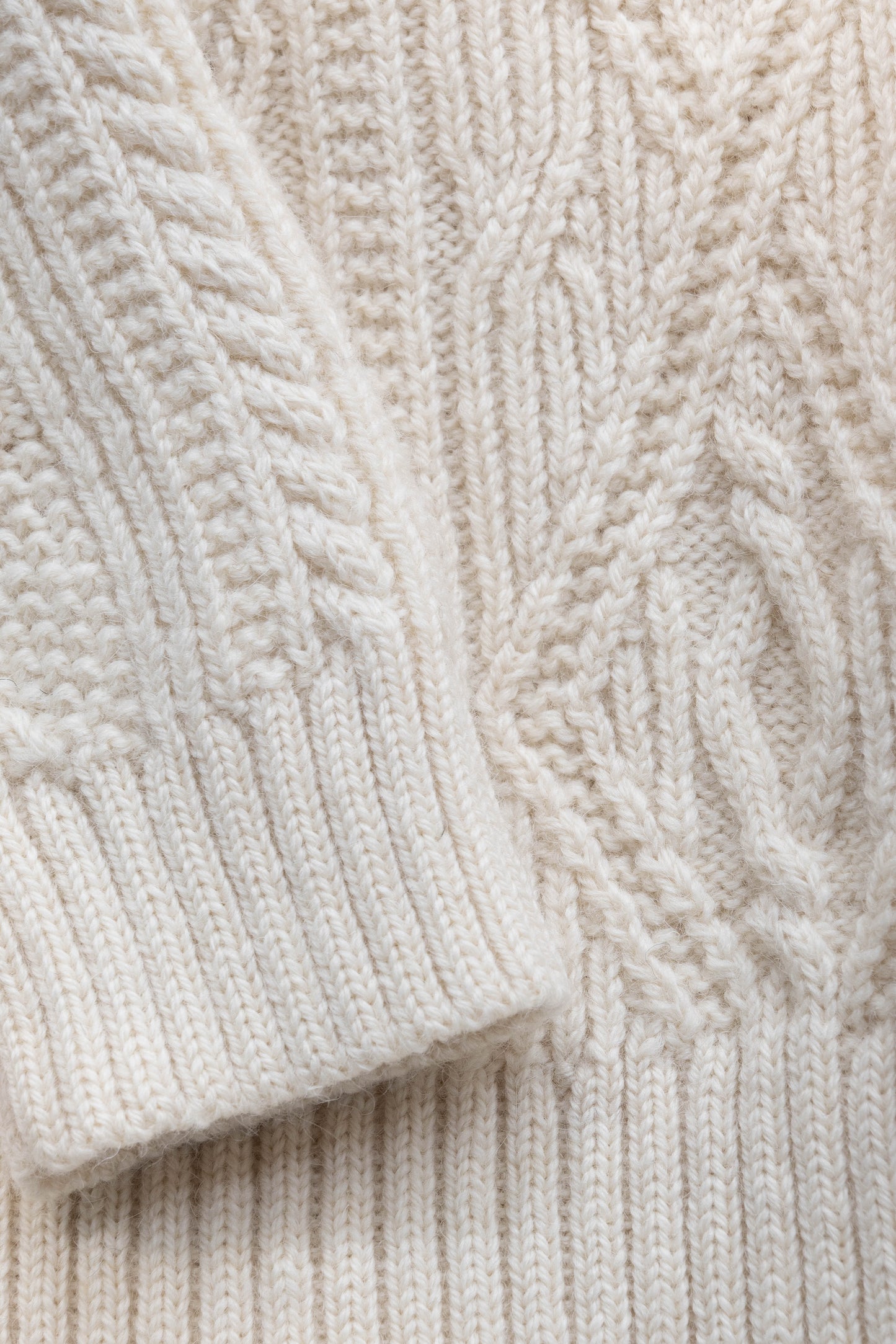 The Lugh British Wool Cable Sweater in Ecru