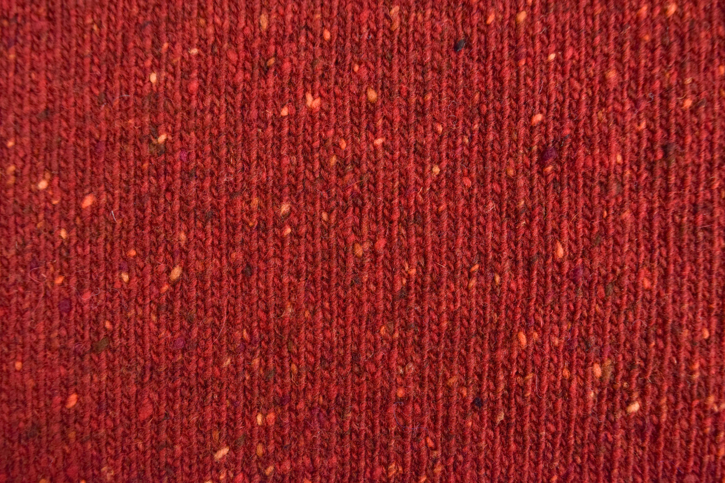 The Kent Donegal Merino Wool Cardigan in Brick Red