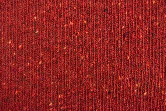 The Kent Donegal Merino Wool Cardigan in Brick Red