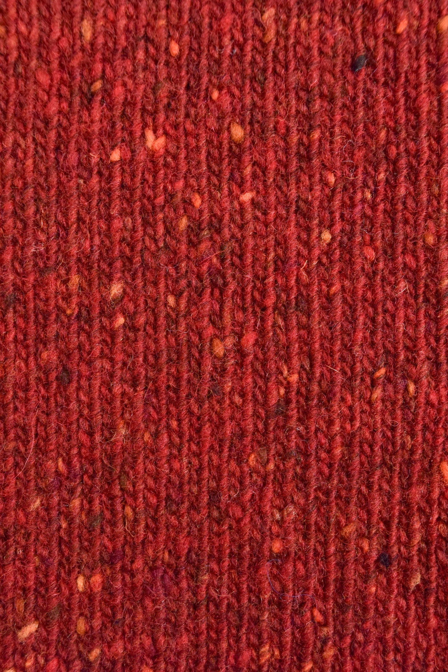 The Kent Donegal Merino Wool Cardigan in Brick Red