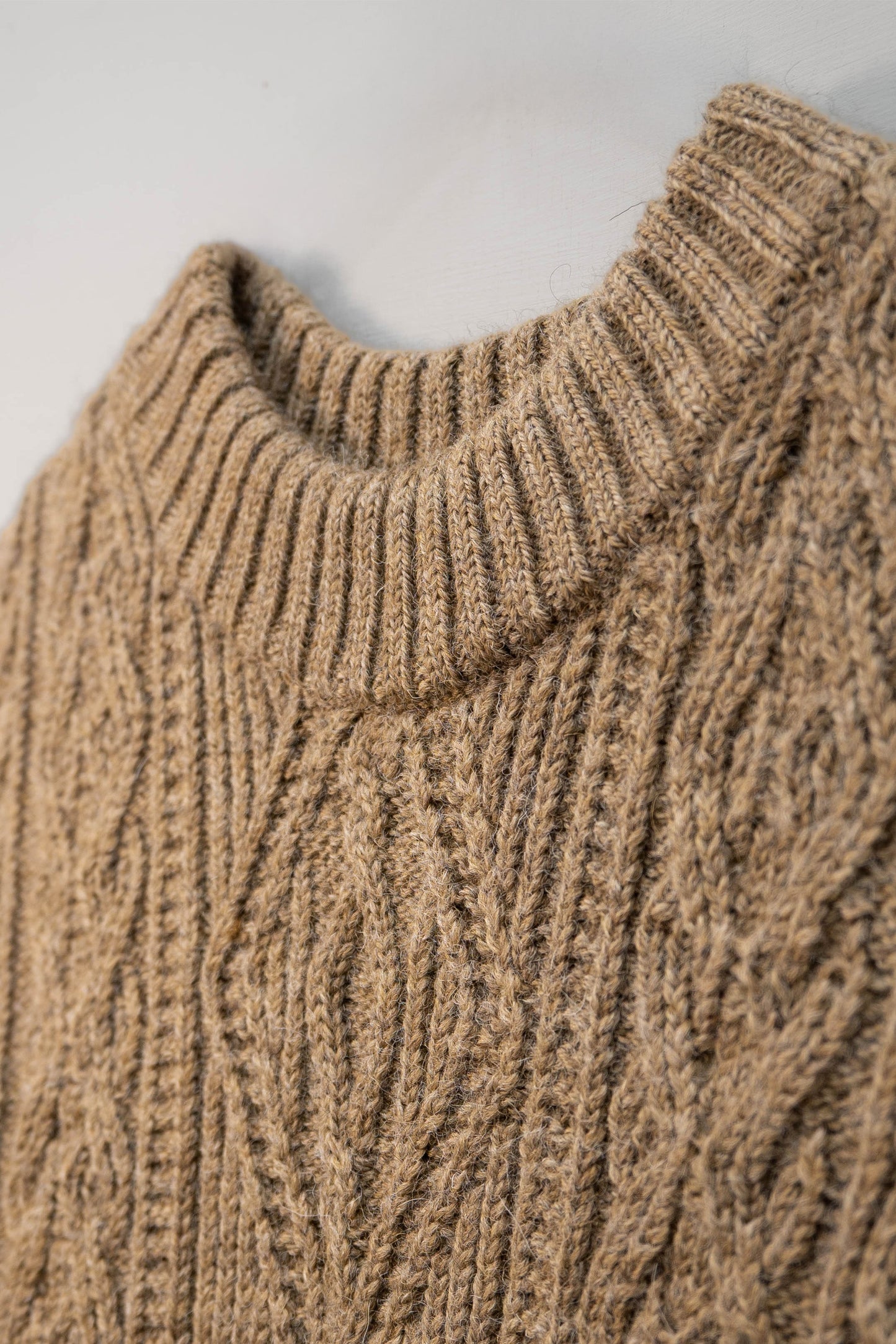 The Freyja British Wool Cable Vest in Bronze Olive