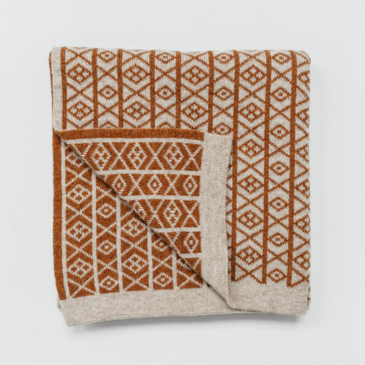 The Ruskin British Wool Jacquard Blanket in Ochre / Cream