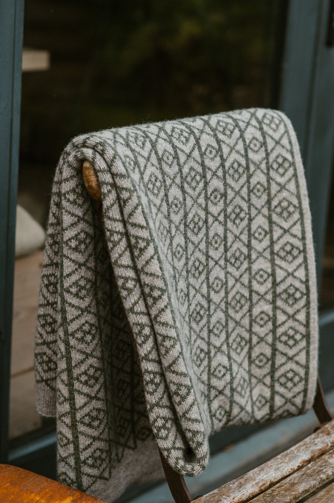 The Ruskin British Wool Jacquard Blanket in Sage Green / Grey