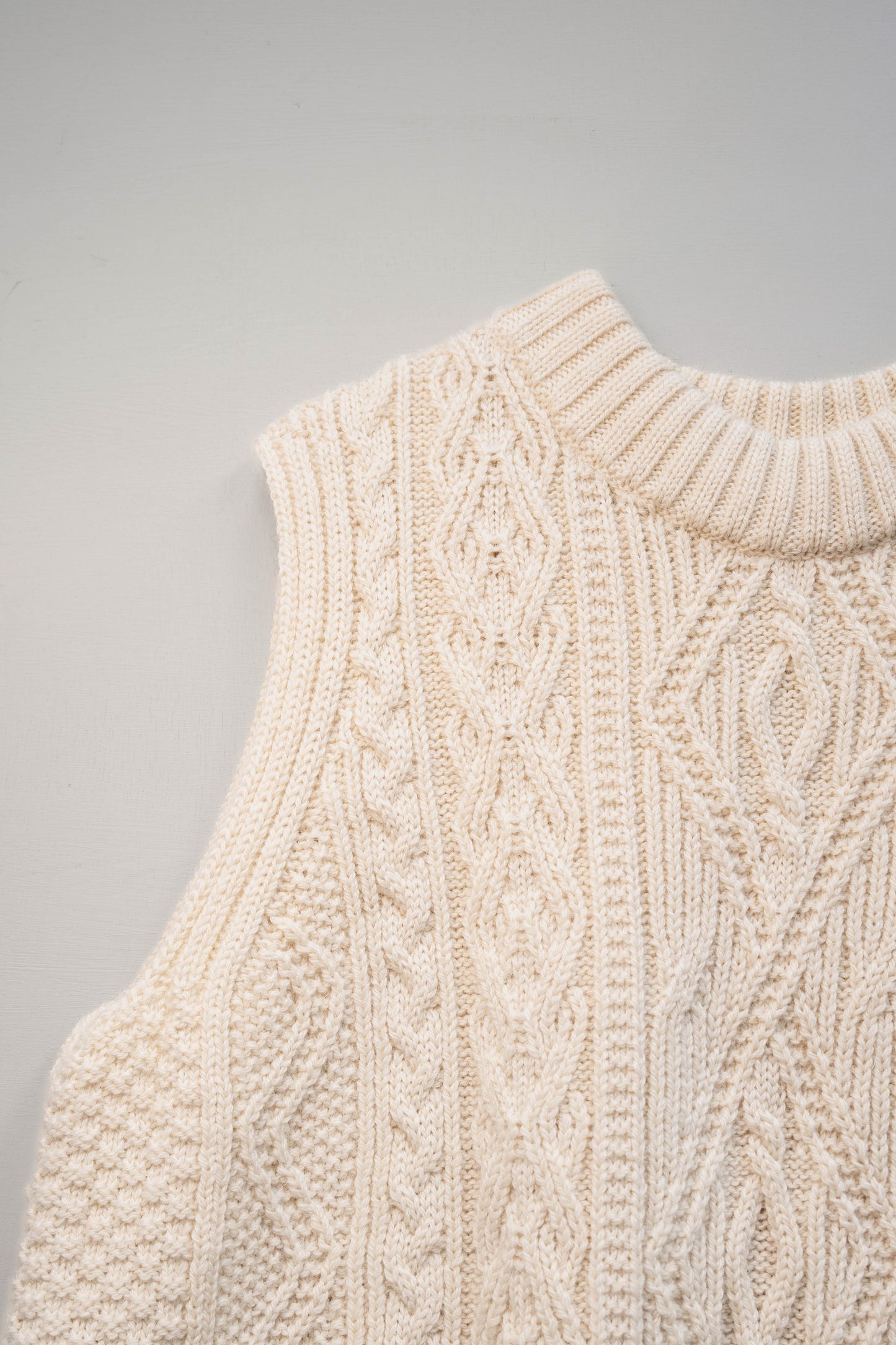 The Freyja British Wool Cable Vest in Ecru