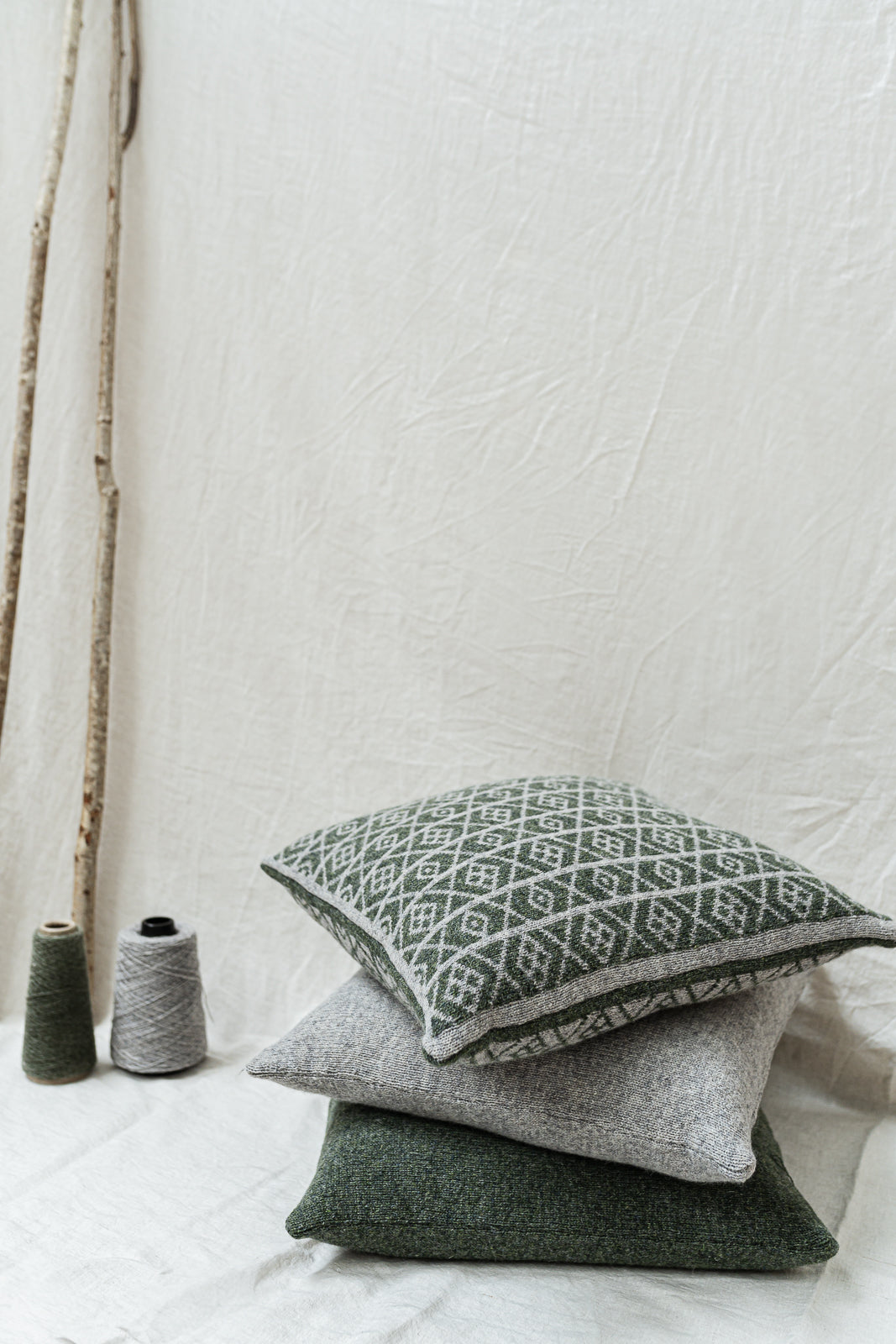 The Ruskin British Wool Jacquard Cushion in Sage Green/ Grey